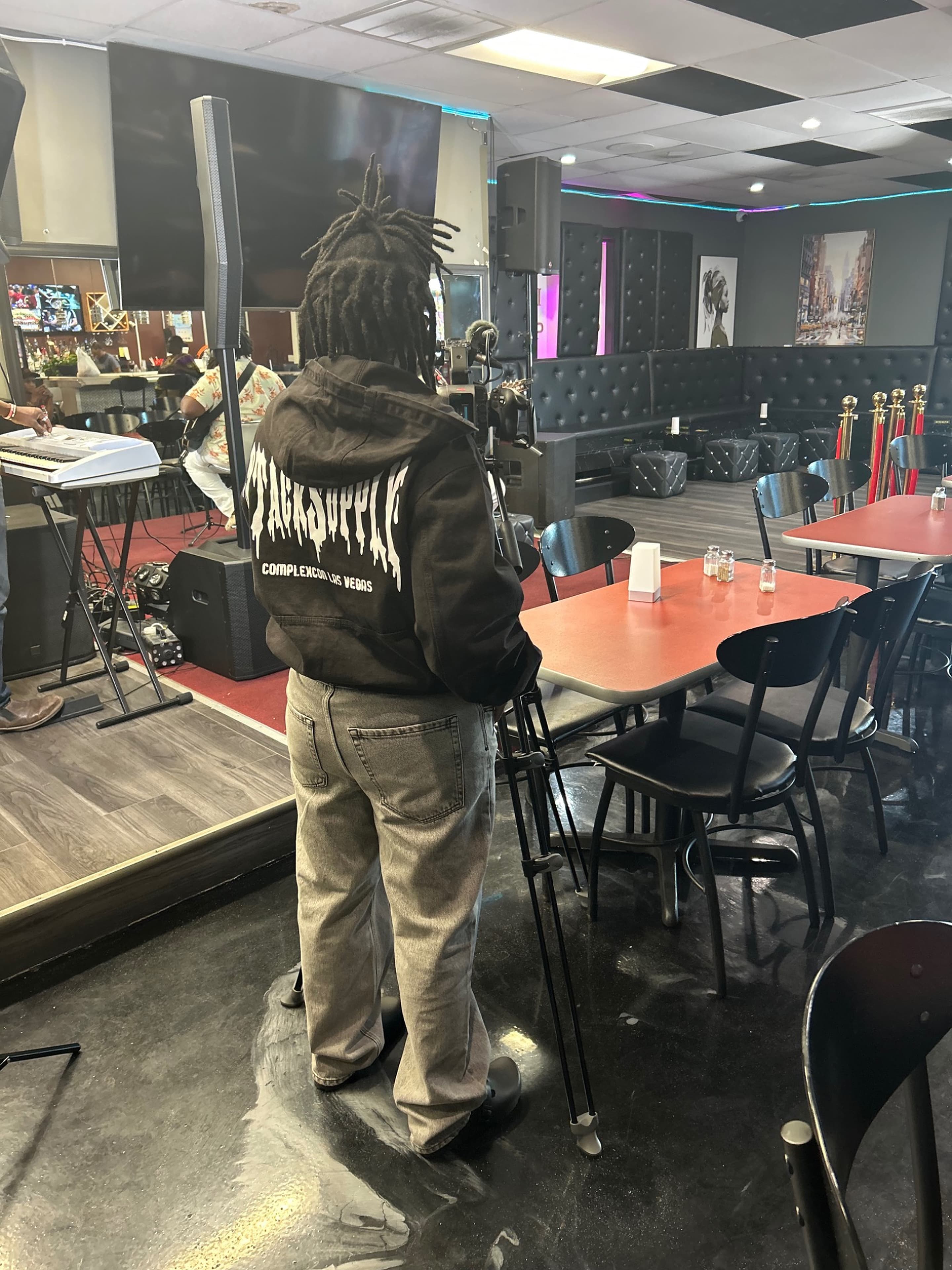 ULP camera operator filming inside a live venue